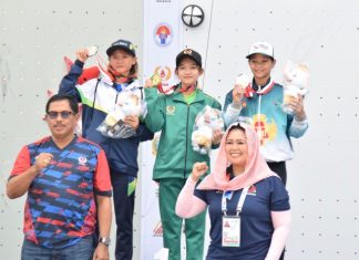 Alma Ariella Tsany (jaket hijau) sukses meraih medali emas di PON XXI 2024 Aceh-Sumut.